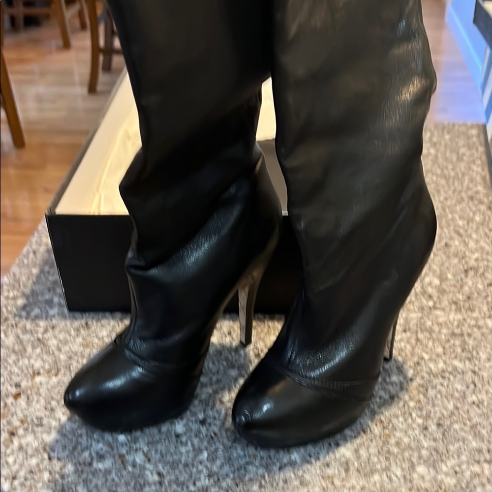 LAMB black leather pull on boots.